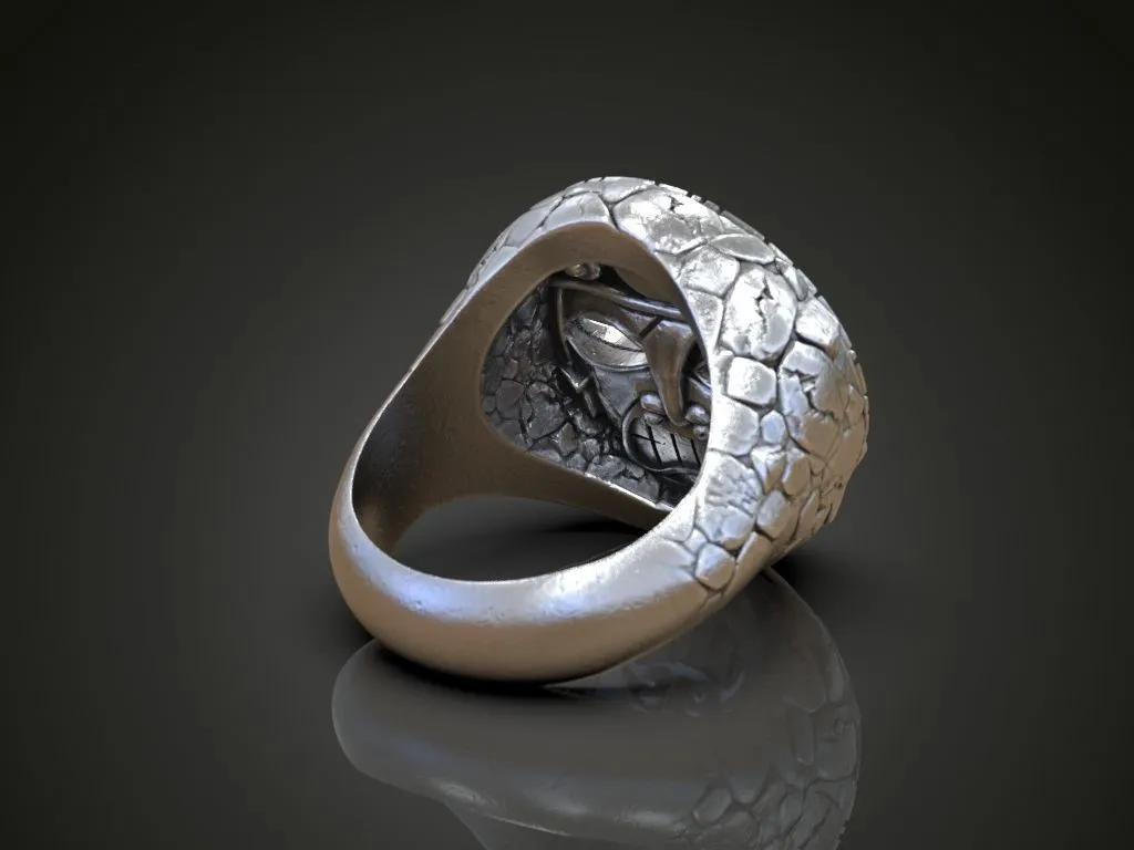 "Silver ring featuring a detailed depiction of Aztec and Maya masks and totems, symbolizing ancient heritage and strength, perfect for those who embrace a bold style."