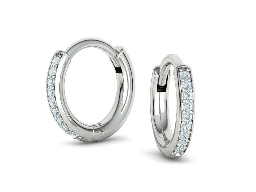 High-polished diamond hoop earrings for women, symbolizing luxury and sophistication, perfect for any occasion.