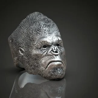 Silver ring featuring a detailed depiction of a gorilla, ape, and monkey, symbolizing strength and wisdom, perfect for those who embrace a bold style.