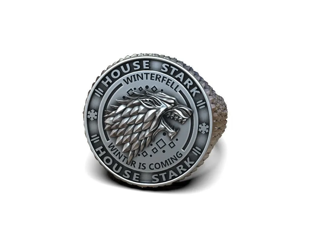 Silver ring featuring a detailed depiction of the direwolf and Winterfell, symbolizing loyalty and strength, perfect for those who embrace a bold style.