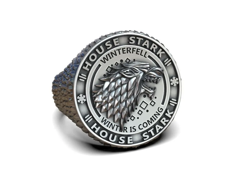 Silver ring featuring a detailed depiction of the direwolf and Winterfell, symbolizing loyalty and strength, perfect for those who embrace a bold style.