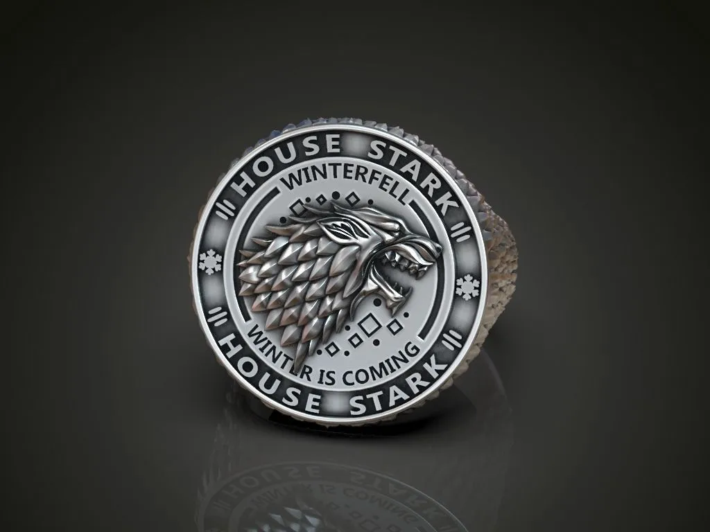 Silver ring featuring a detailed depiction of the direwolf and Winterfell, symbolizing loyalty and strength, perfect for those who embrace a bold style.