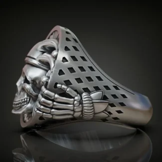 Silver ring featuring a detailed depiction of an undead jester, joker, and clown skull, symbolizing dark elegance and mystery, perfect for those who embrace a bold style.