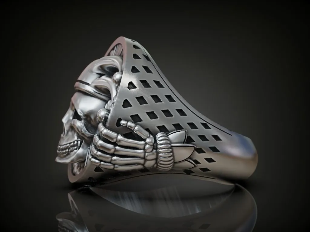 Silver ring featuring a detailed depiction of an undead jester, joker, and clown skull, symbolizing dark elegance and mystery, perfect for those who embrace a bold style.