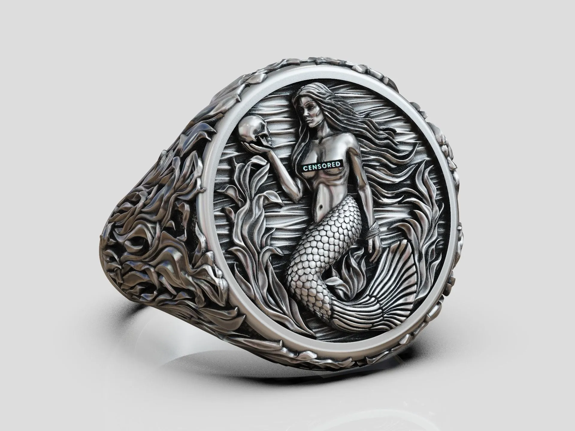 Silver signet ring featuring a detailed mermaid siren and seaweed design, symbolizing allure and mystery, perfect for those who embrace a bold style.