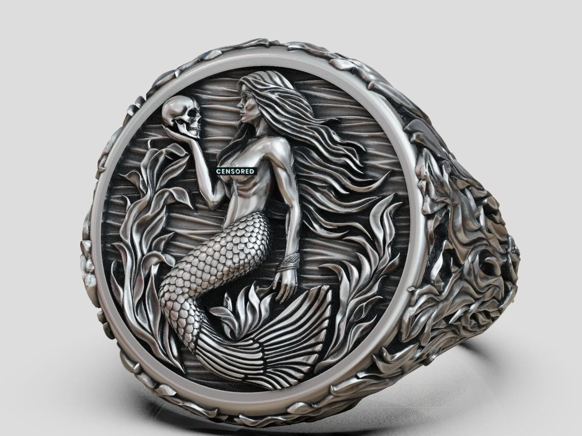 Silver signet ring featuring a detailed mermaid siren and seaweed design, symbolizing allure and mystery, perfect for those who embrace a bold style.