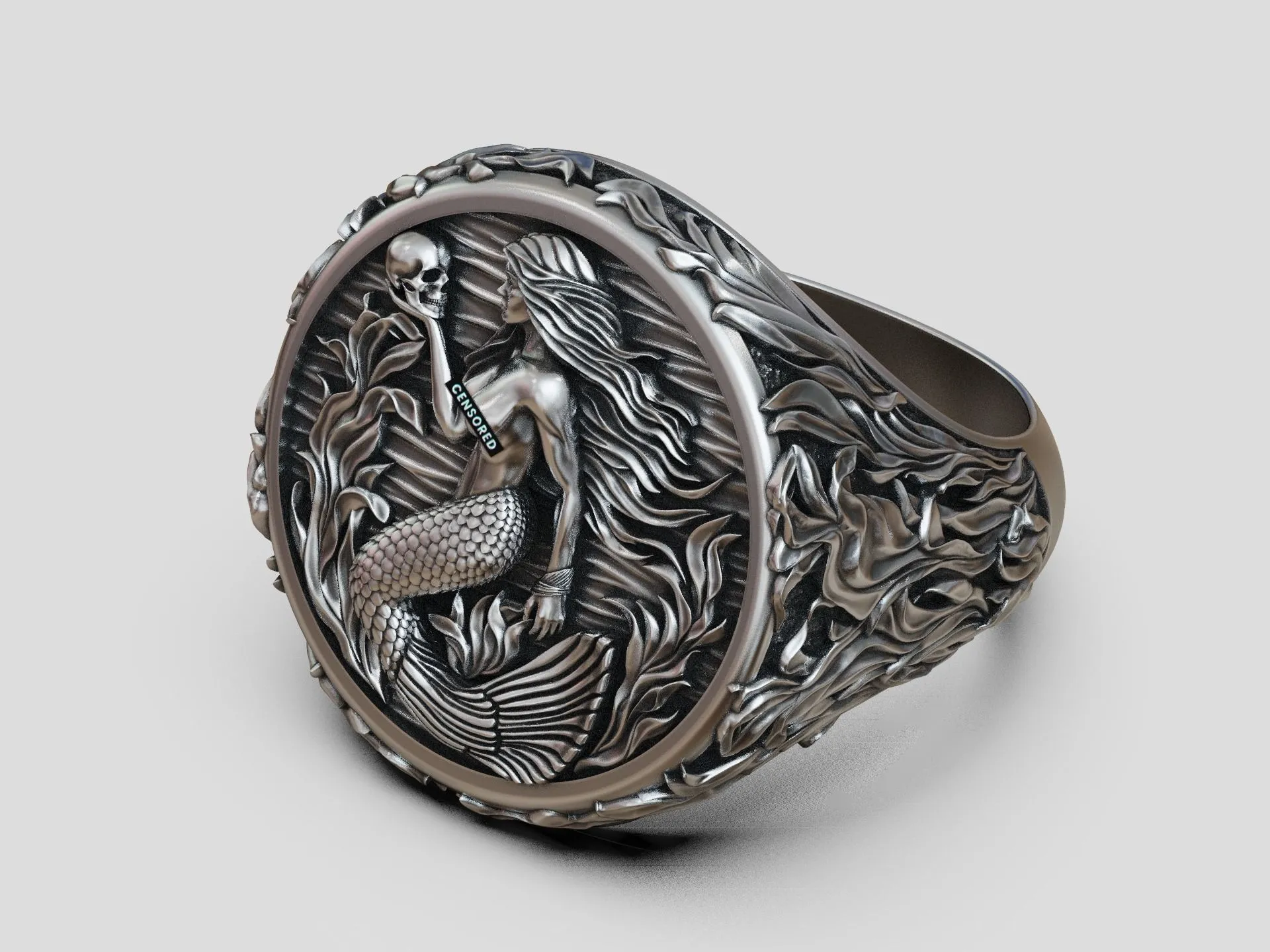 Silver signet ring featuring a detailed mermaid siren and seaweed design, symbolizing allure and mystery, perfect for those who embrace a bold style.
