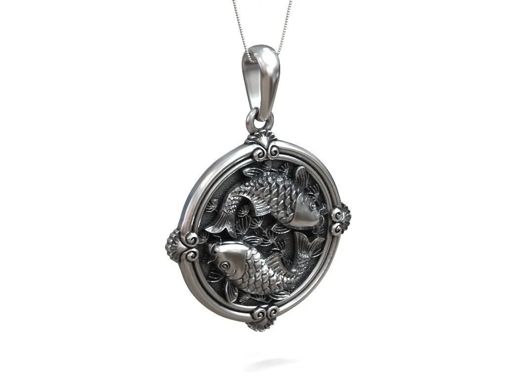 Small round silver pendant featuring elegantly designed koi carp, symbolizing good fortune and grace