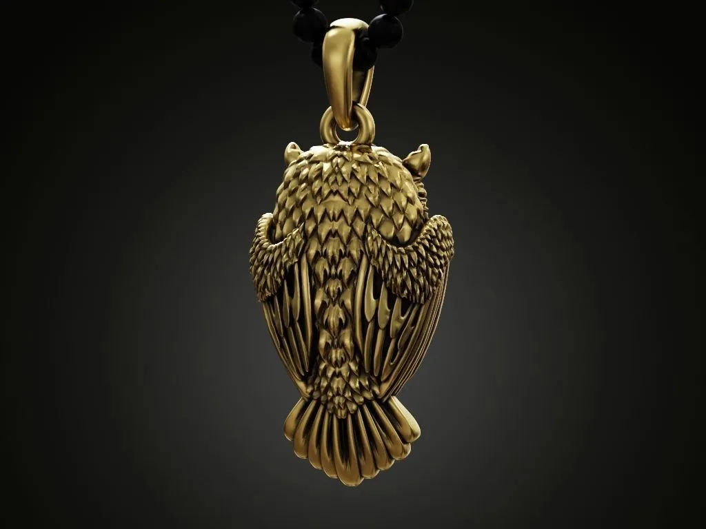Silver pendant of an owl, intricately designed to showcase its detailed feathers and wise expression.