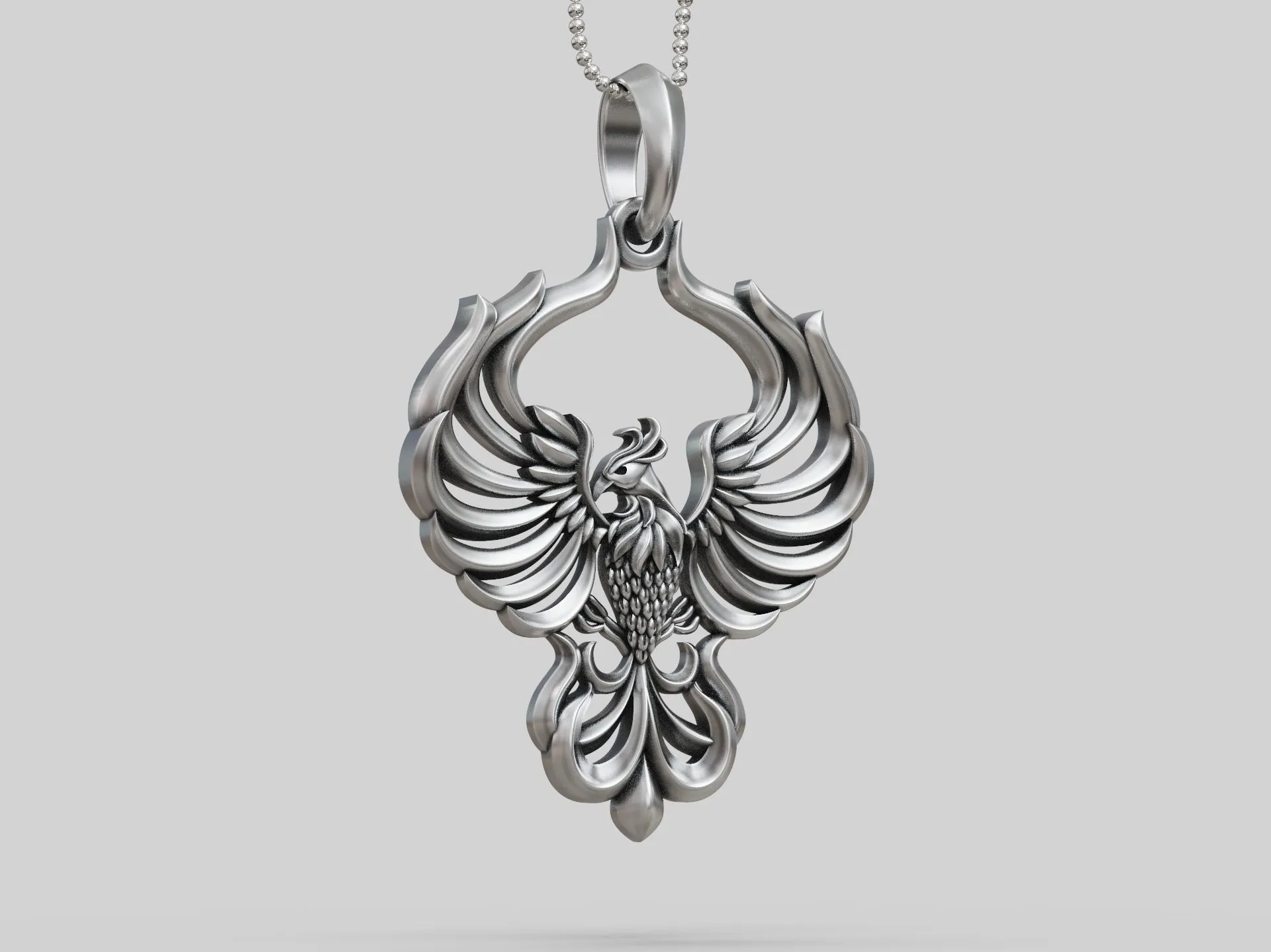 Phoenix Bird Pendant-4 Silver Phoenix Bird Pendant depicting the mythical phoenix in mid-flight, symbolizing rebirth and renewal.
