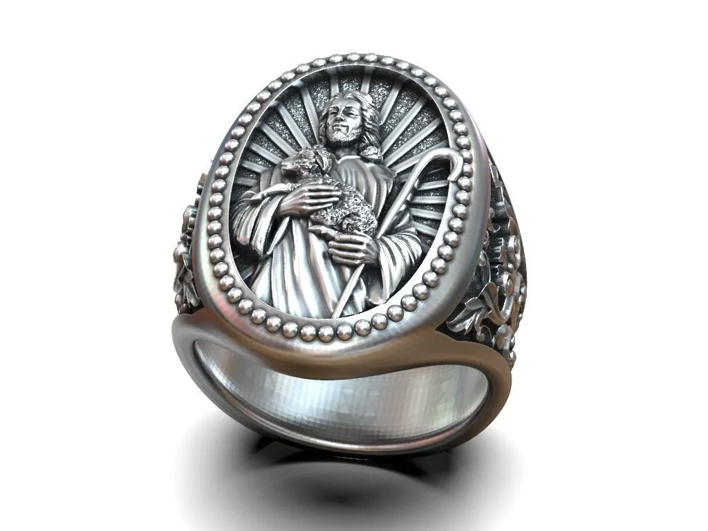 Silver ring featuring a detailed depiction of Jesus Christ holding a lamb, symbolizing compassion and faith, perfect for those who embrace a bold style.