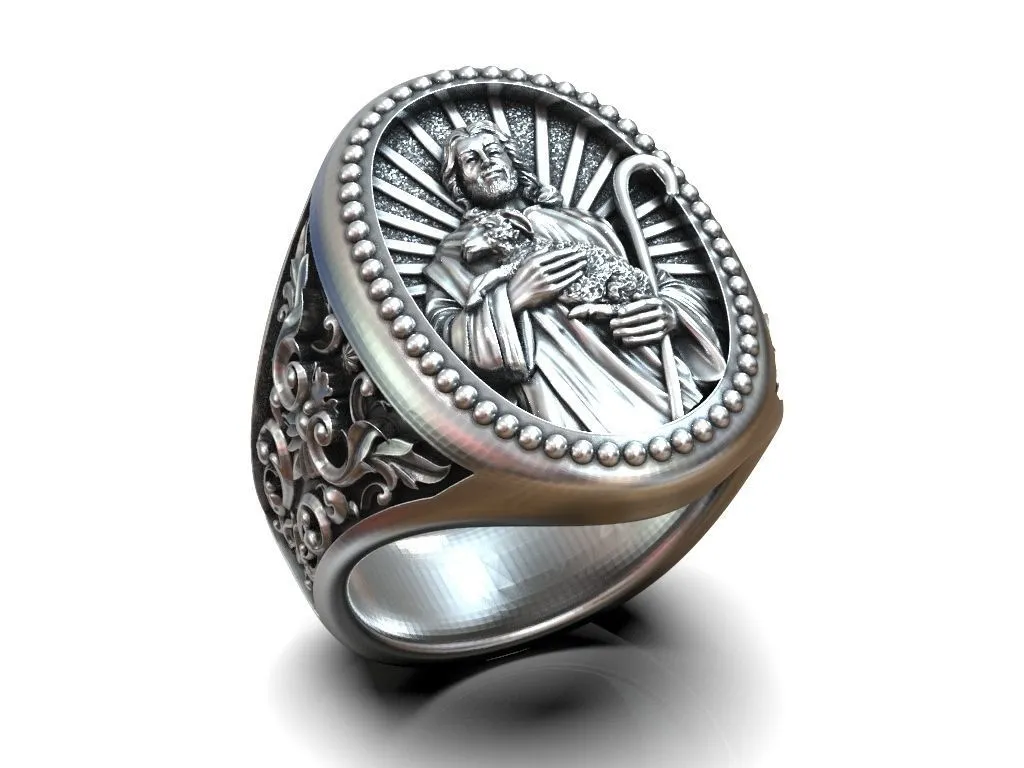 Silver ring featuring a detailed depiction of Jesus Christ holding a lamb, symbolizing compassion and faith, perfect for those who embrace a bold style.