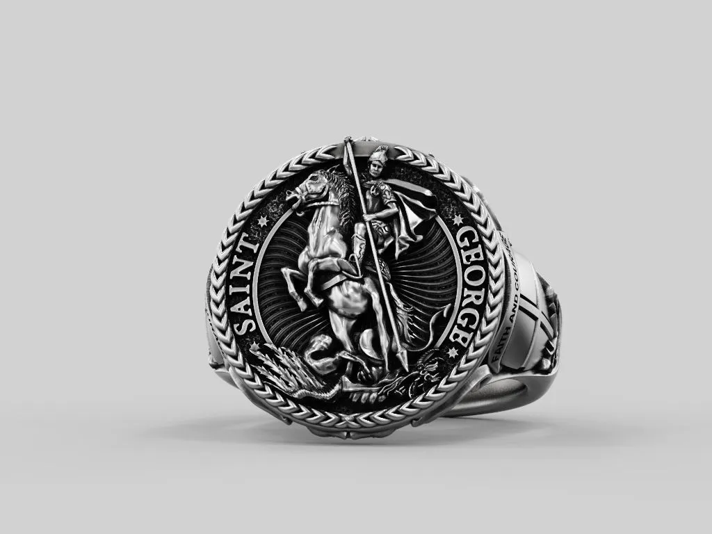 Silver ring featuring a detailed depiction of Saint George slaying the dragon, symbolizing courage and triumph, perfect for those who embrace a bold style.