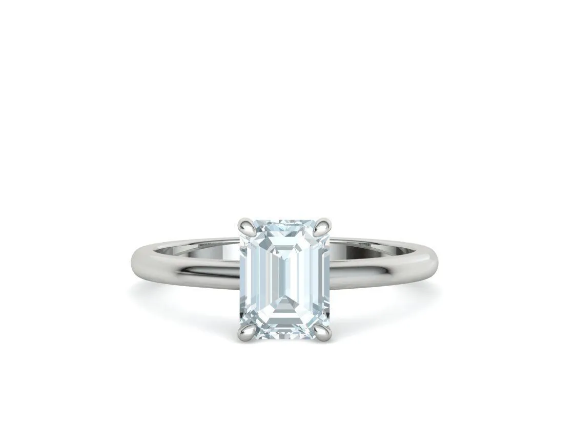 High-polished Emerald Cut Solitaire Ring with an 8x6mm emerald cut solitaire diamond, symbolizing luxury and elegance, perfect for any occasion.