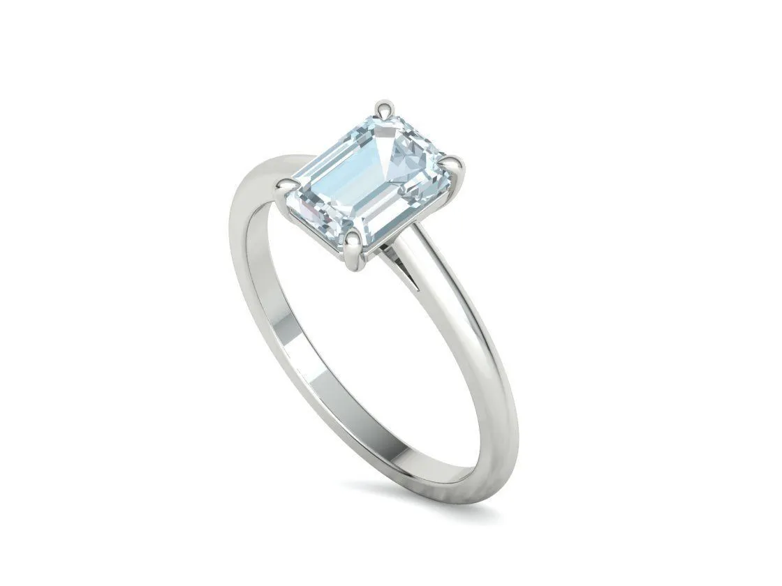 High-polished Emerald Cut Solitaire Ring with an 8x6mm emerald cut solitaire diamond, symbolizing luxury and elegance, perfect for any occasion.