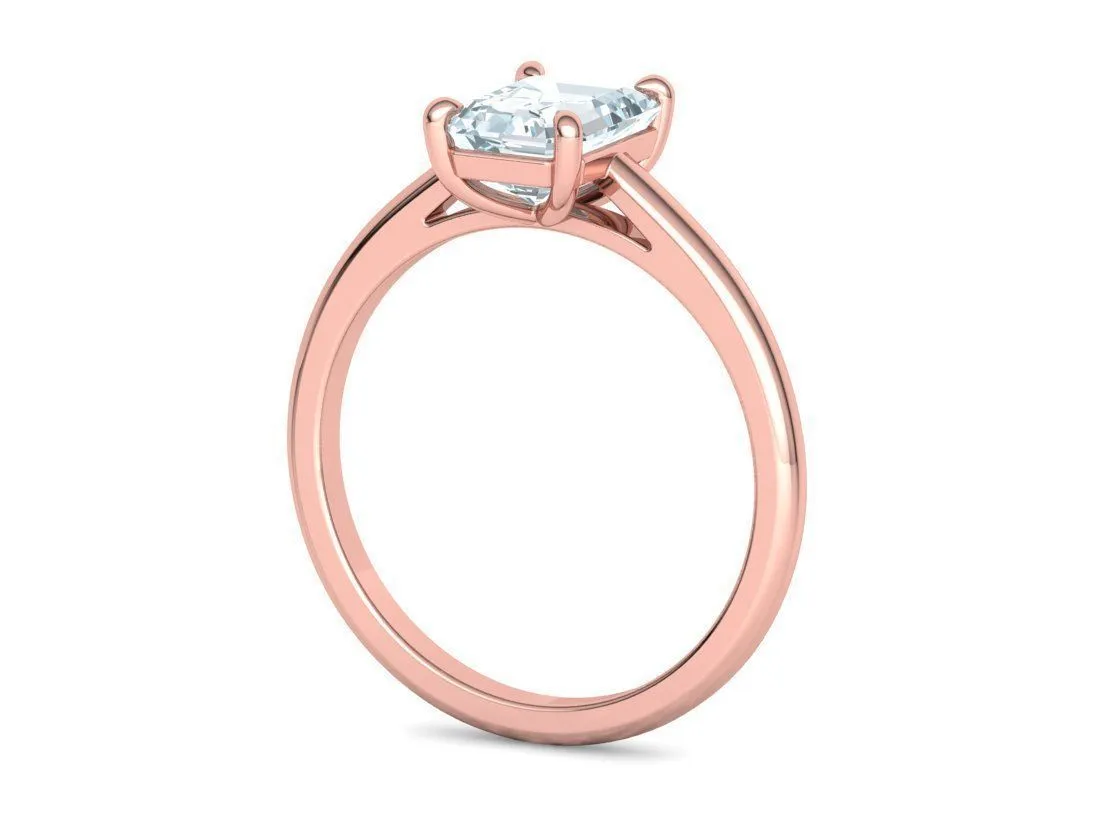 High-polished Emerald Cut Solitaire Ring with an 8x6mm emerald cut solitaire diamond, symbolizing luxury and elegance, perfect for any occasion.