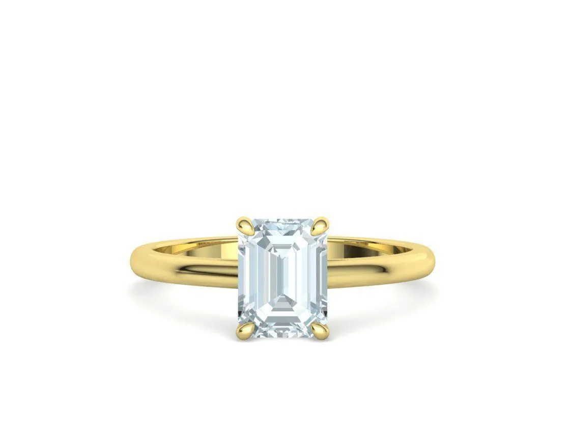 High-polished Emerald Cut Solitaire Ring with an 8x6mm emerald cut solitaire diamond, symbolizing luxury and elegance, perfect for any occasion.