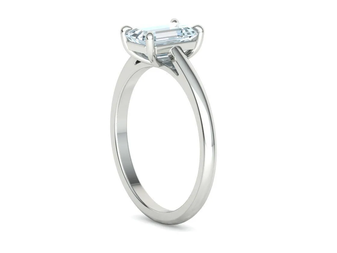 High-polished Emerald Cut Solitaire Ring with an 8x6mm emerald cut solitaire diamond, symbolizing luxury and elegance, perfect for any occasion.