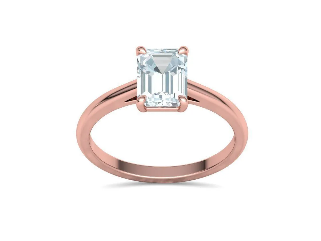 High-polished Emerald Cut Solitaire Ring with an 8x6mm emerald cut solitaire diamond, symbolizing luxury and elegance, perfect for any occasion.