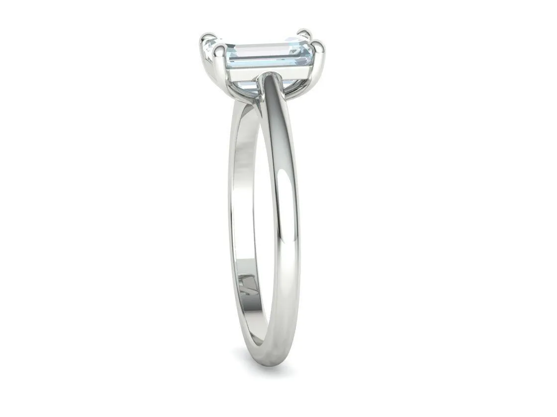 High-polished Emerald Cut Solitaire Ring with an 8x6mm emerald cut solitaire diamond, symbolizing luxury and elegance, perfect for any occasion.