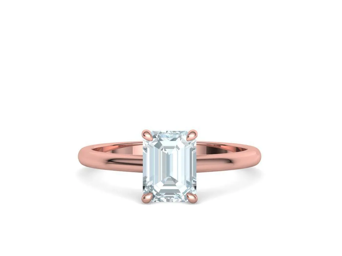 High-polished Emerald Cut Solitaire Ring with an 8x6mm emerald cut solitaire diamond, symbolizing luxury and elegance, perfect for any occasion.
