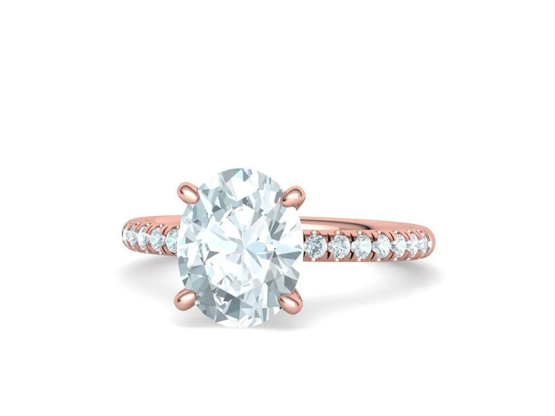 High-polished Oval Pavé Solitaire Ring with a brilliant oval solitaire diamond and pavé-set band, symbolizing luxury and elegance, perfect for any occasion.