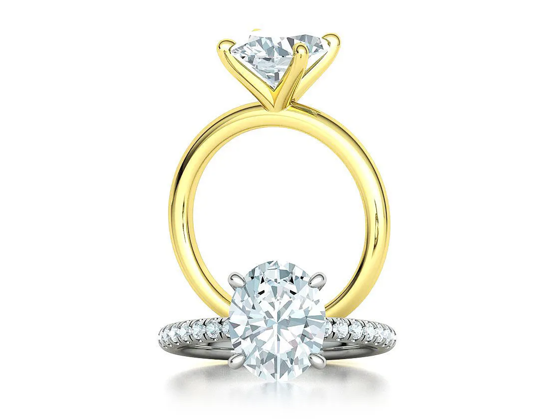 High-polished Oval Pavé Solitaire Ring with a brilliant oval solitaire diamond and pavé-set band, symbolizing luxury and elegance, perfect for any occasion.