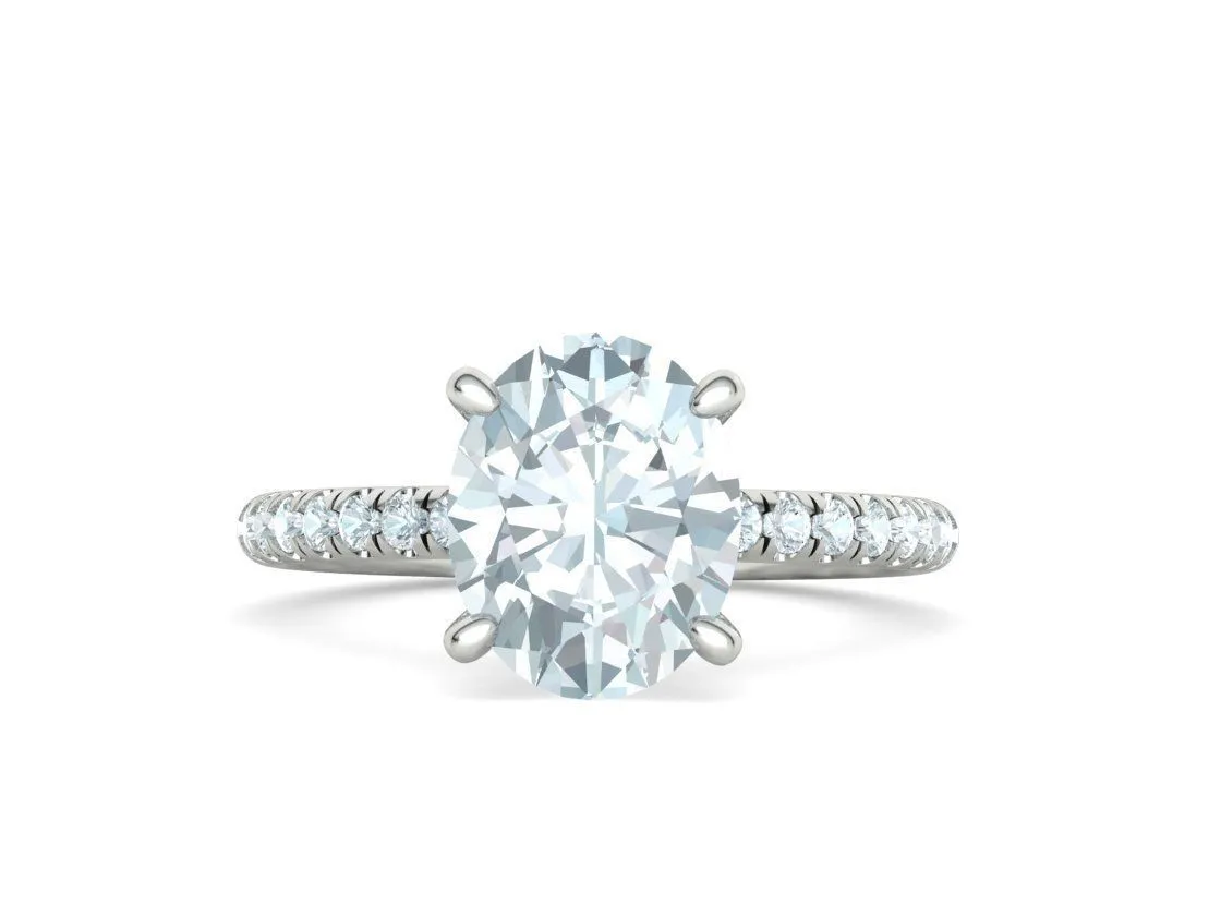 High-polished Oval Pavé Solitaire Ring with a brilliant oval solitaire diamond and pavé-set band, symbolizing luxury and elegance, perfect for any occasion.