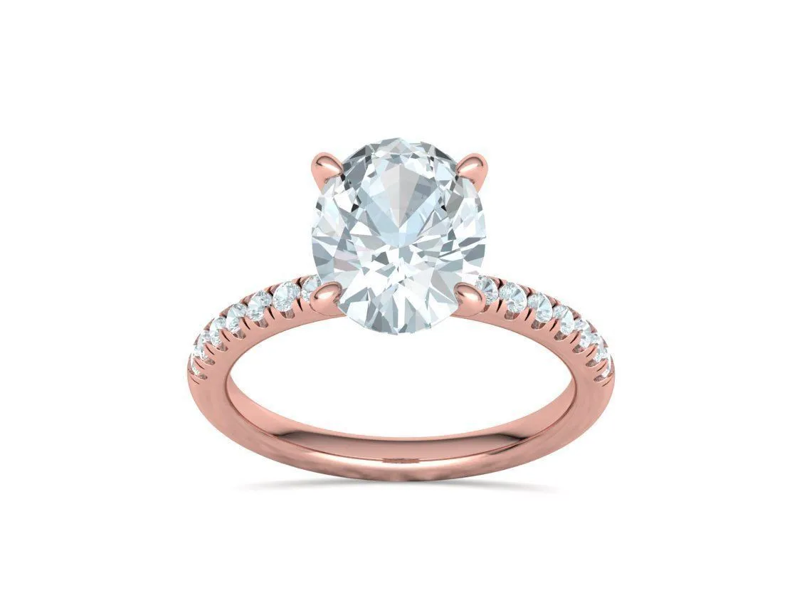 High-polished Oval Pavé Solitaire Ring with a brilliant oval solitaire diamond and pavé-set band, symbolizing luxury and elegance, perfect for any occasion.