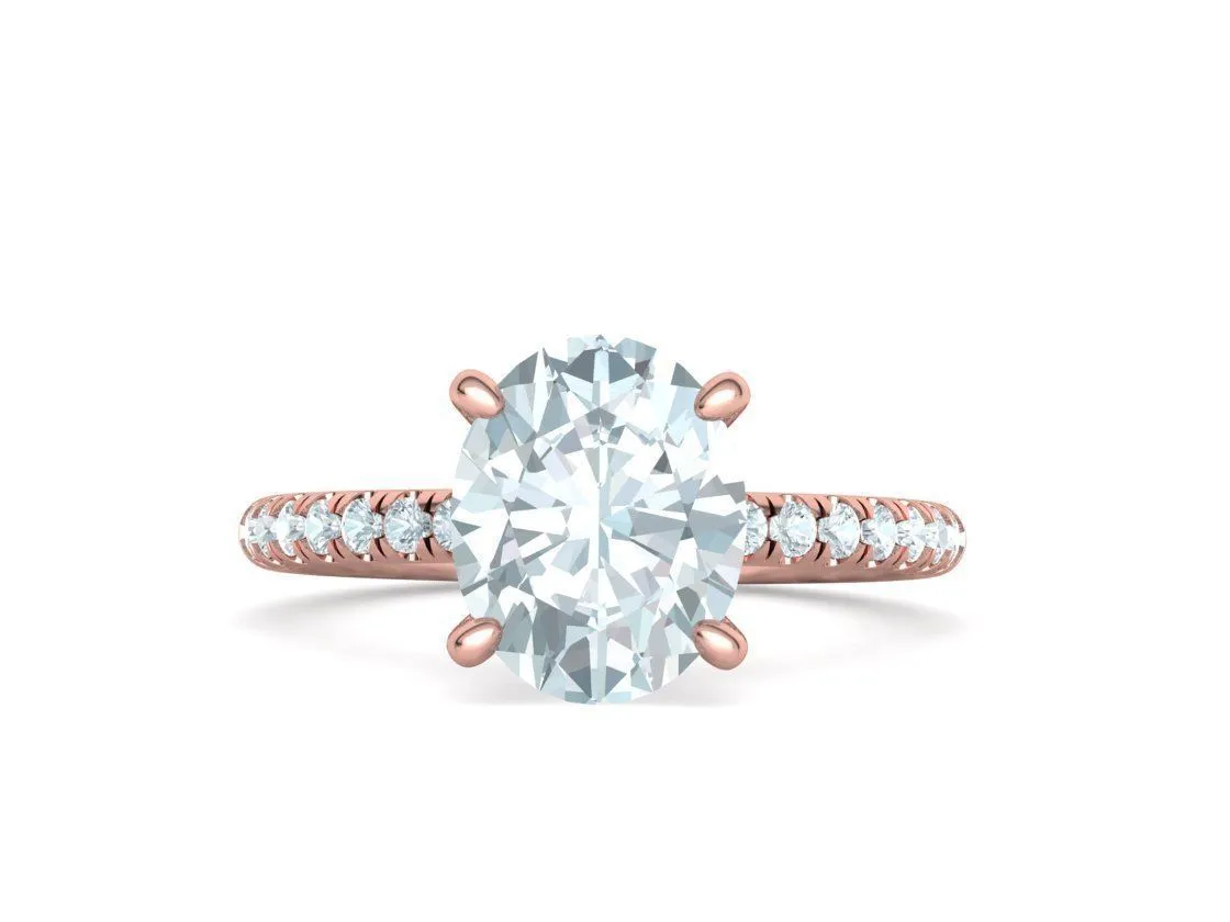 High-polished Oval Pavé Solitaire Ring with a brilliant oval solitaire diamond and pavé-set band, symbolizing luxury and elegance, perfect for any occasion.