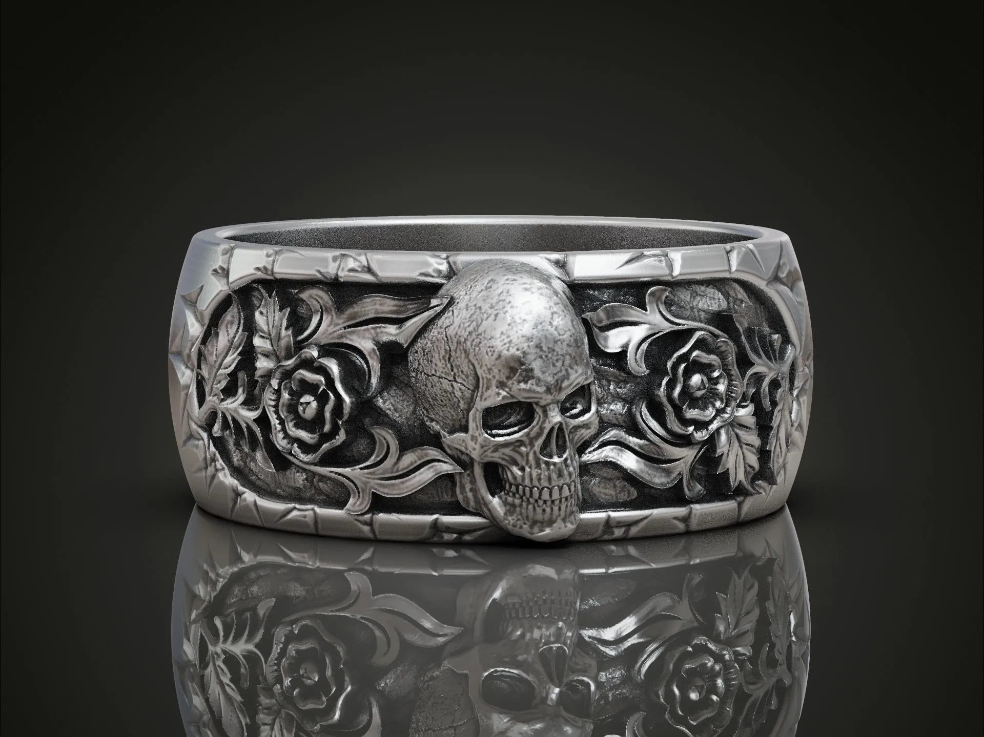 Silver band ring featuring a detailed skull and flowers design, symbolizing strength and beauty, perfect for those who embrace a bold style.