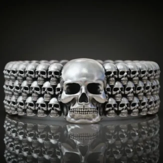 Silver biker band ring featuring detailed skulls, symbolizing strength and resilience, perfect for those who embrace a bold style.