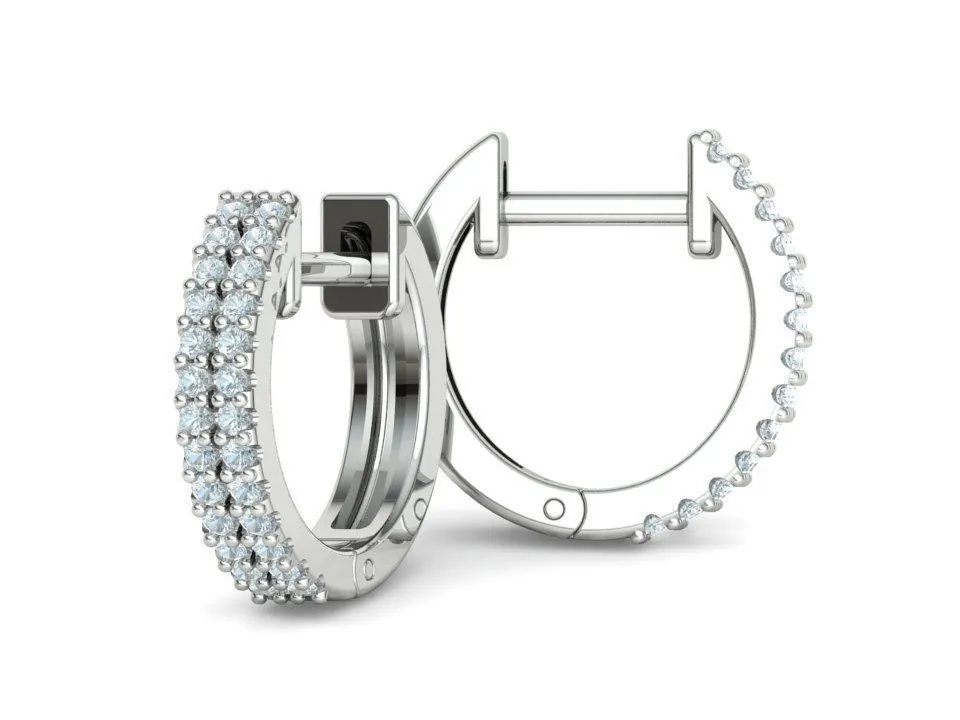 High-polished small hoop earrings adorned with diamonds, symbolizing luxury and sophistication, perfect for any occasion.