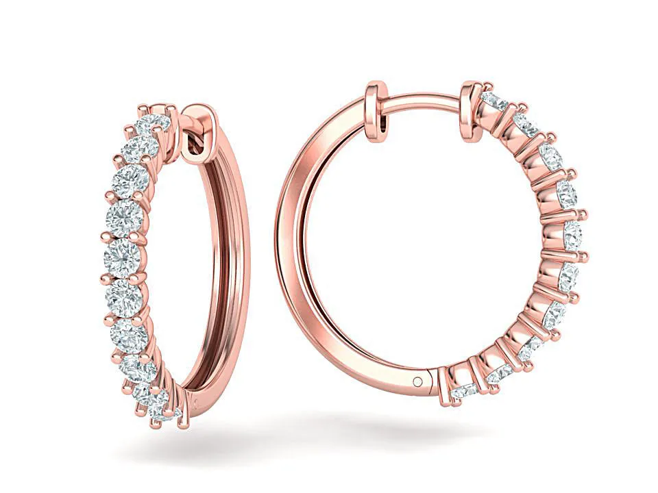 High-polished 20mm hoop earrings adorned with sparkling diamonds, symbolizing luxury and sophistication, perfect for any occasion.