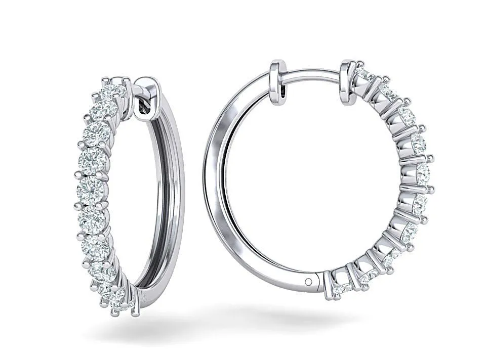 High-polished 20mm hoop earrings adorned with sparkling diamonds, symbolizing luxury and sophistication, perfect for any occasion.