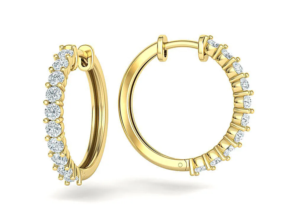 High-polished 20mm hoop earrings adorned with sparkling diamonds, symbolizing luxury and sophistication, perfect for any occasion.