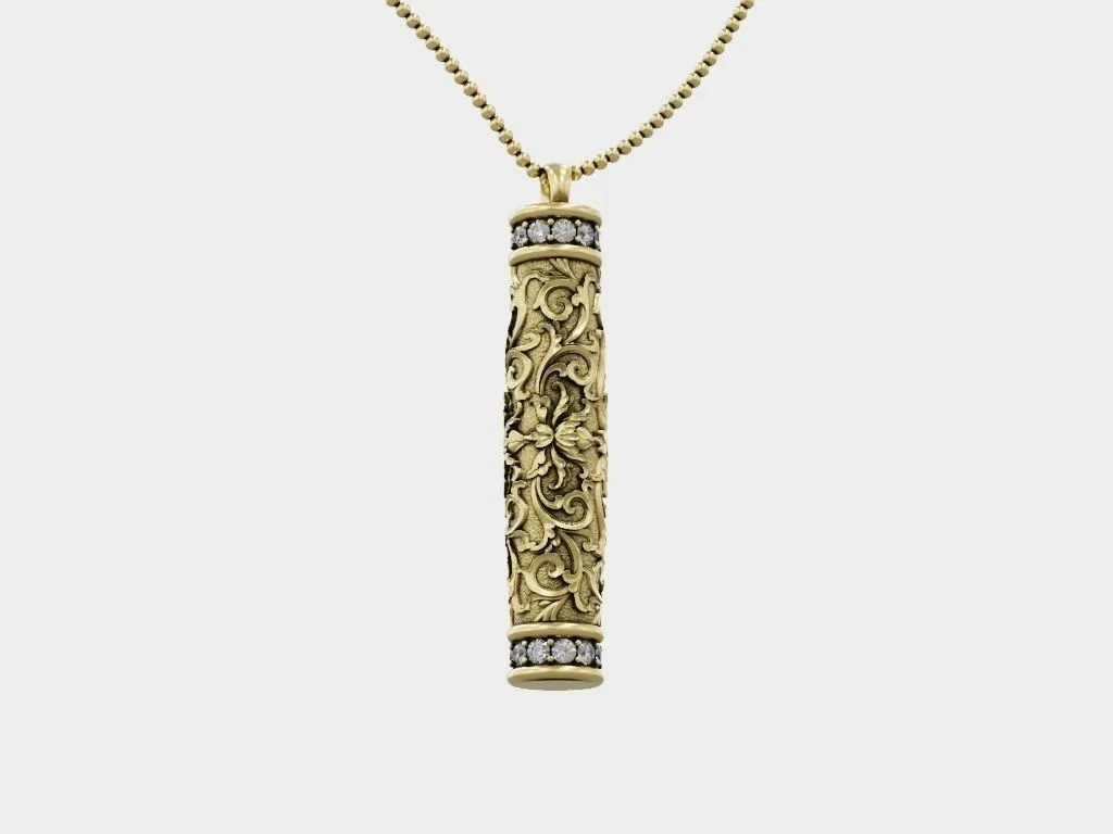 Silver tube pendant with Baroque floral patterns, showcasing intricate and historical art in jewelry design.