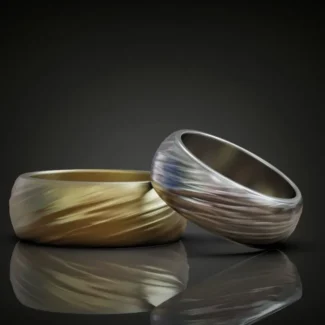 Wedding bands featuring a detailed wavy pattern, symbolizing the flowing journey of love, perfect for couples who embrace a bold style.