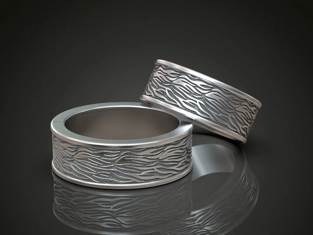 Wedding bands featuring detailed designs, symbolizing love and commitment, perfect for couples who embrace a bold style.