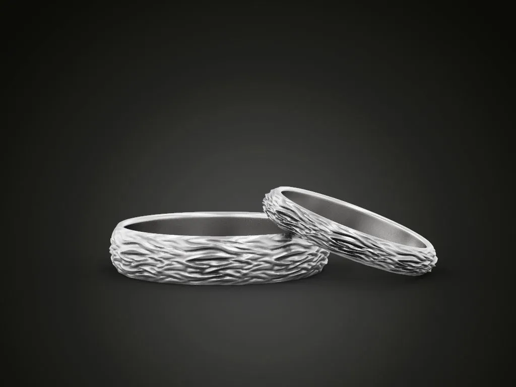 Wedding ring featuring a detailed textured water surface design, symbolizing the ever-changing yet enduring nature of love, perfect for couples.