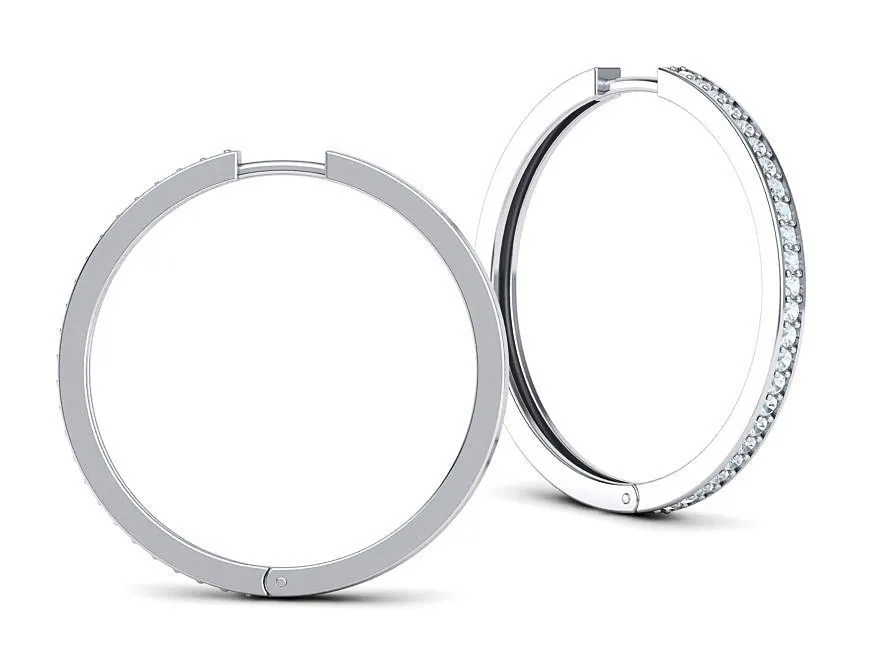 High-polished 30mm hoop earrings adorned with diamonds, symbolizing luxury and sophistication, perfect for any occasion.