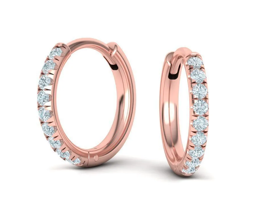 High-polished 1.55mm French pavé hoop earrings adorned with pavé diamonds, symbolizing luxury and sophistication, perfect for any occasion.