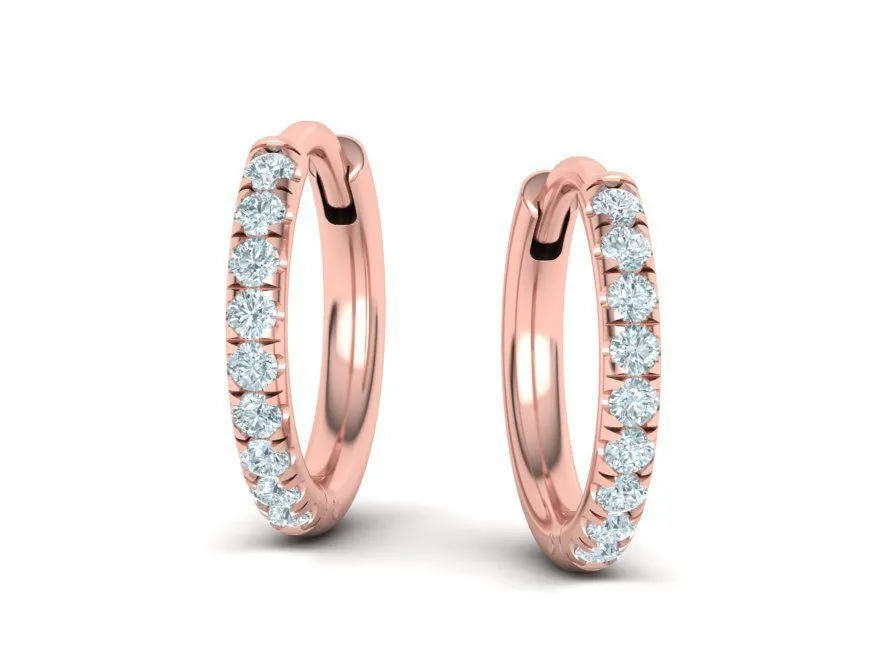 High-polished 1.55mm French pavé hoop earrings adorned with pavé diamonds, symbolizing luxury and sophistication, perfect for any occasion.