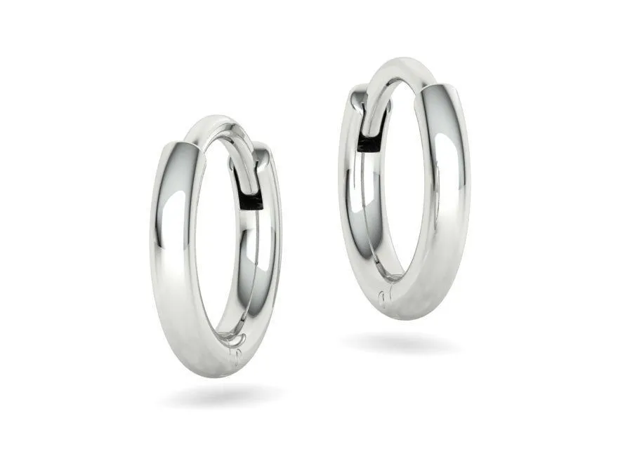 High-polished round hoop earrings for women, symbolizing timeless elegance and sophistication, perfect for any occasion.