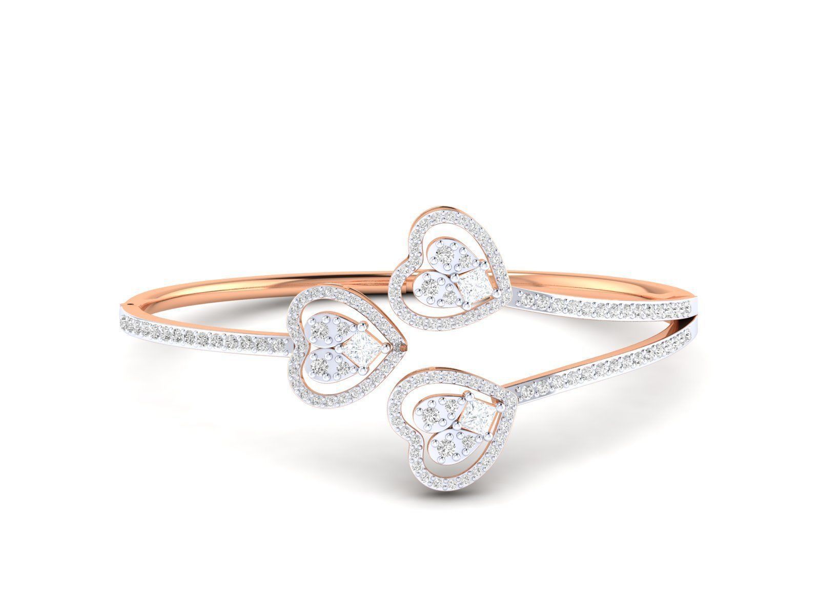 Sterling silver bracelet with three heart-shaped charms adorned with sparkling stones.