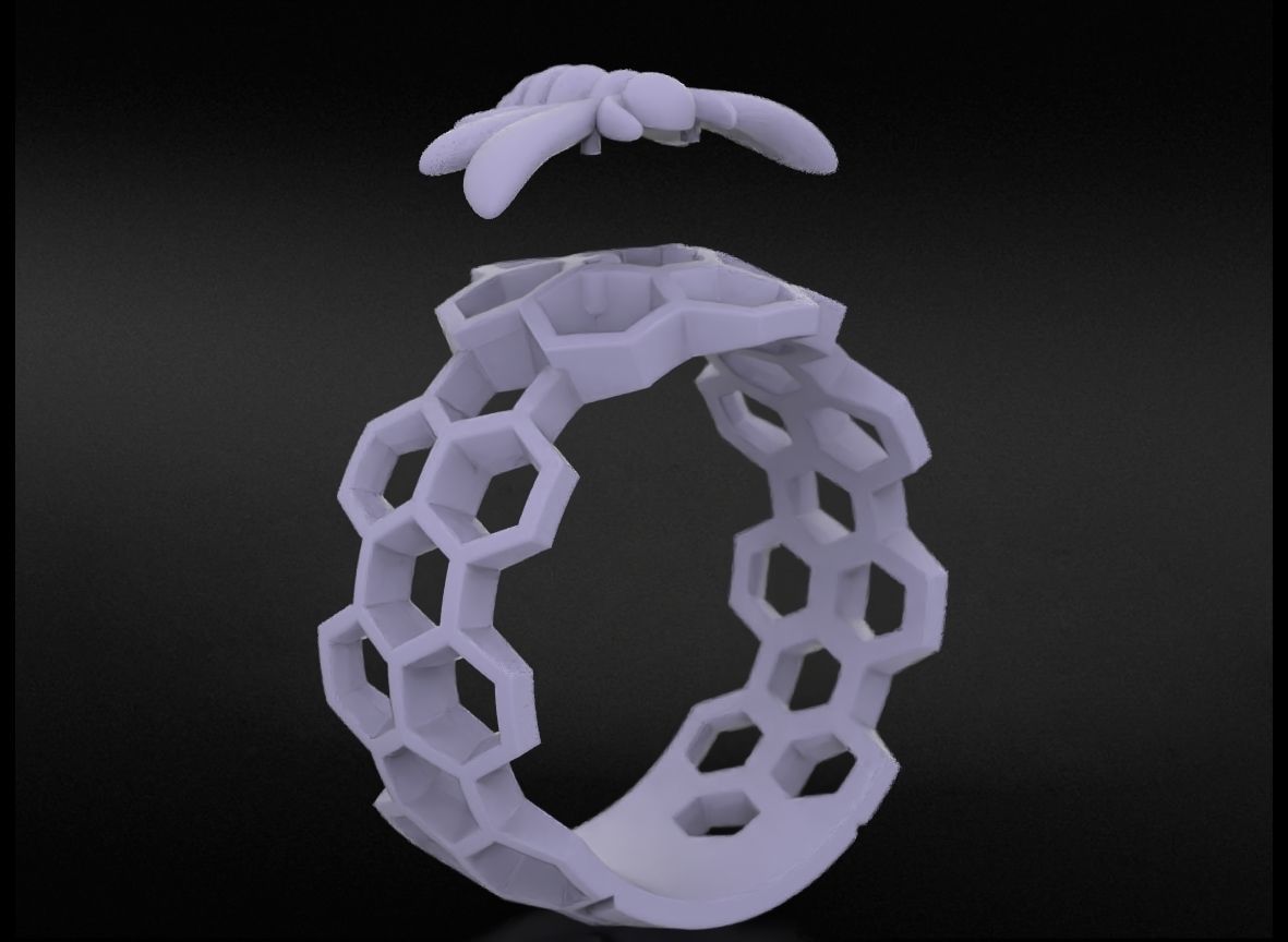 Ring with Honeycombs (7) Honeycomb Bee Silver Ring with intricate bee and honeycomb design, crafted in sterling silver for a charming look.