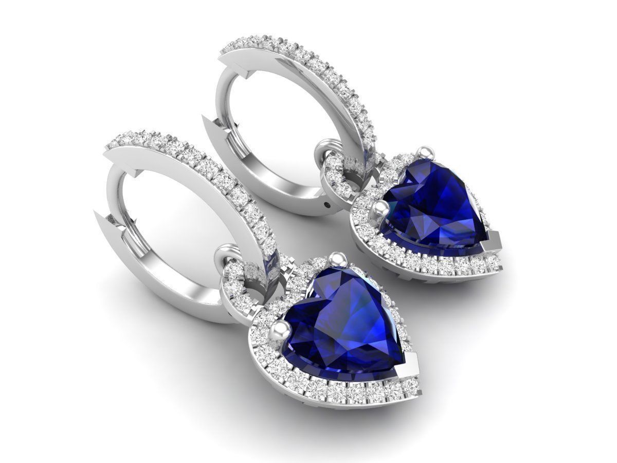 Blue Heart Silver Earrings with a central blue heart stone and sparkling accents.