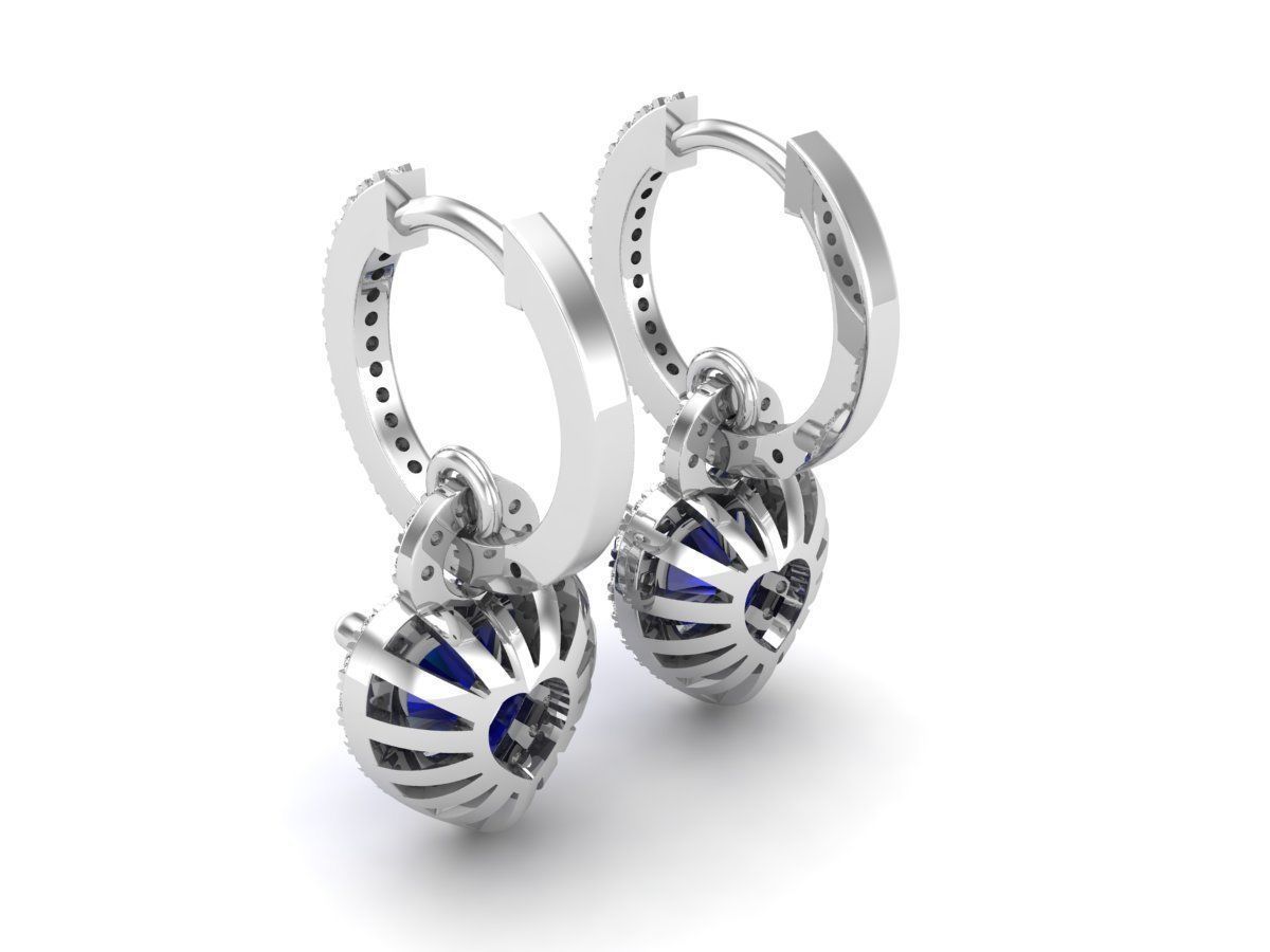 Blue Heart Silver Earrings with a central blue heart stone and sparkling accents.