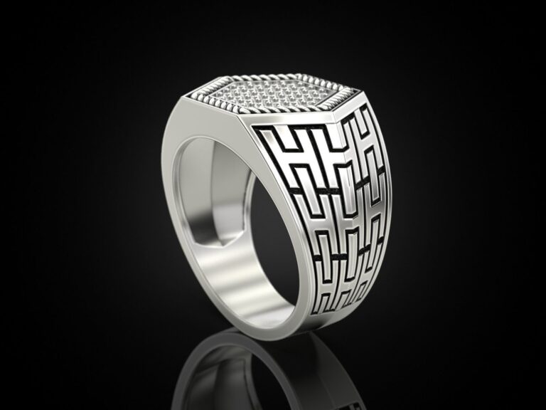 Handcrafted artisan geometric silver ring with unique design.