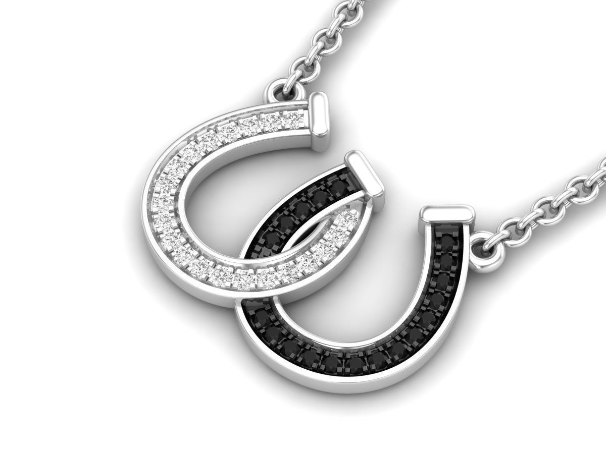 Sterling silver necklace with a sparkling couple horseshoe pendant.